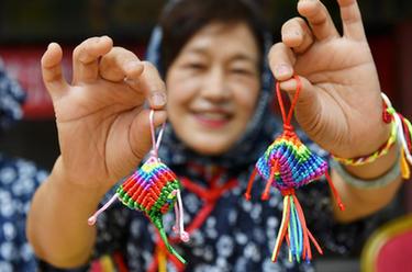 詩(shī)意中國丨五色新絲纏角粽