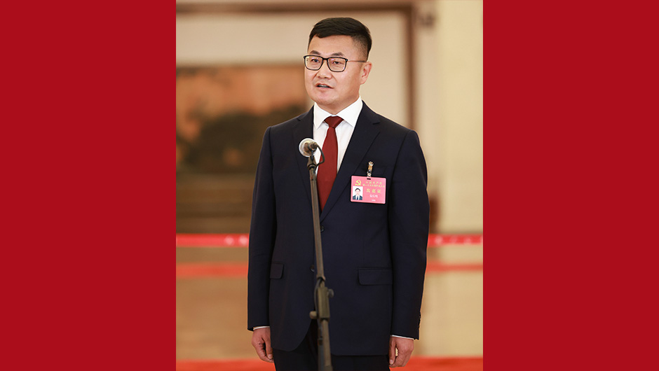 安長(cháng)明代表接受采訪(fǎng)